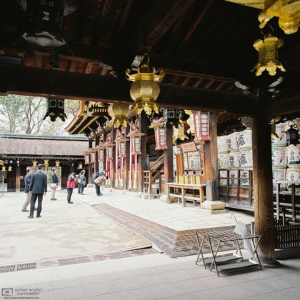 Visitors arriving for prayer, Kitano Tenmangu, Kyoto, Japan Photo