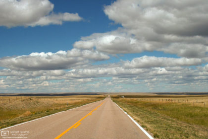 Endless prairies and fluffy clouds along State Highway 29 near Mitchell, Nebraska.