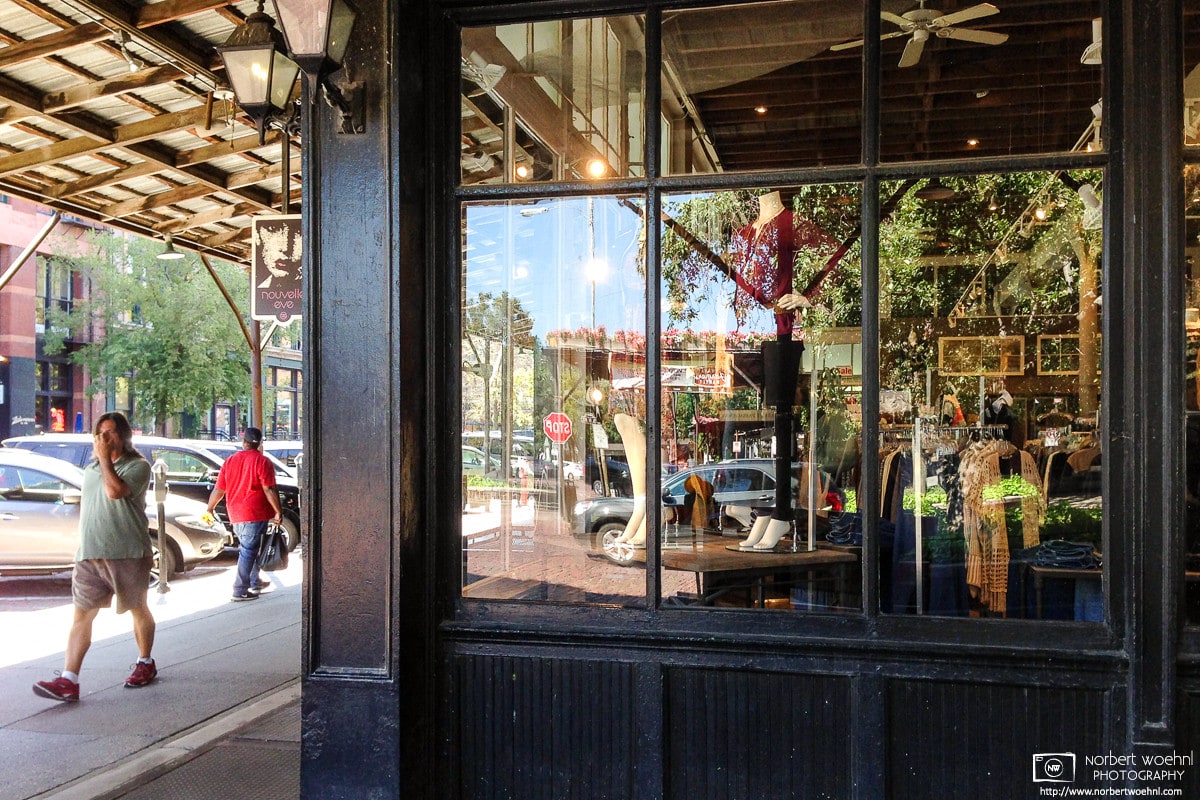 Reflections in a shop window on a street corner in the Old Market neighborhood of downtown Omaha, Nebraska, U.S.