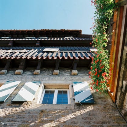 Focusing on a variety of architectural details looking up along the facade of the Zollernschloss in Balingen, Germany.