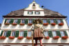 A view of the statue atop the 1537 Market Fountain in front of the City Hall of Weil der Stadt, Germany.