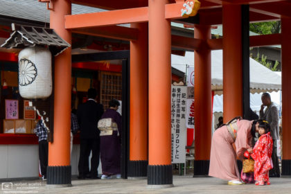 A scene from Shichi-Go-San (七五三) at Ikuta Jinja, a beautiful Shintō shrine in the center of Kobe, Japan. Shichigosan is a traditional Japanese rite of passage, held every year in mid-November for three- and seven-year-old girls and five-year-old boys to celebrate their growth and well-being.