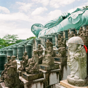 Statues and decorative elements around the Reclining Buddha at Nanzoin Temple in Sasaguri, Fukuoka Prefecture, Japan.