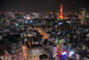 View towards an illuminated Tokyo Tower from a hotel room at the Park Hotel Shiodome in Tokyo, Japan.