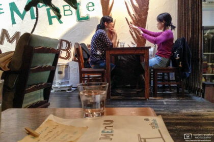 At the delightful Cafe Marble in Kyoto, Japan, two customers are enjoying a relaxing discussion.