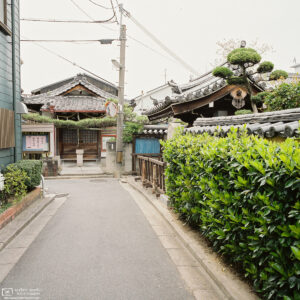 A quiet corner in the backstreets of Nara, Japan, close to Jōtokuji Temple whose premises are visible to the right.