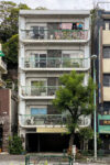 A colorful balcony on the upper floor of this apartment building in the Azabu-jūban area of Tokyo, Japan.