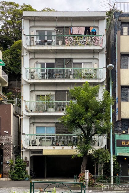A colorful balcony on the upper floor of this apartment building in the Azabu-jūban area of Tokyo, Japan.