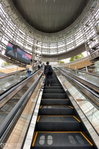 Social-distancing marks are painted on the steps of an escalator to Mori Tower in Roppongi, Tokyo, Japan.