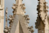 A statue on top of one of the rooftop spires at Duomo, the glorious cathedral at Milan, Italy.